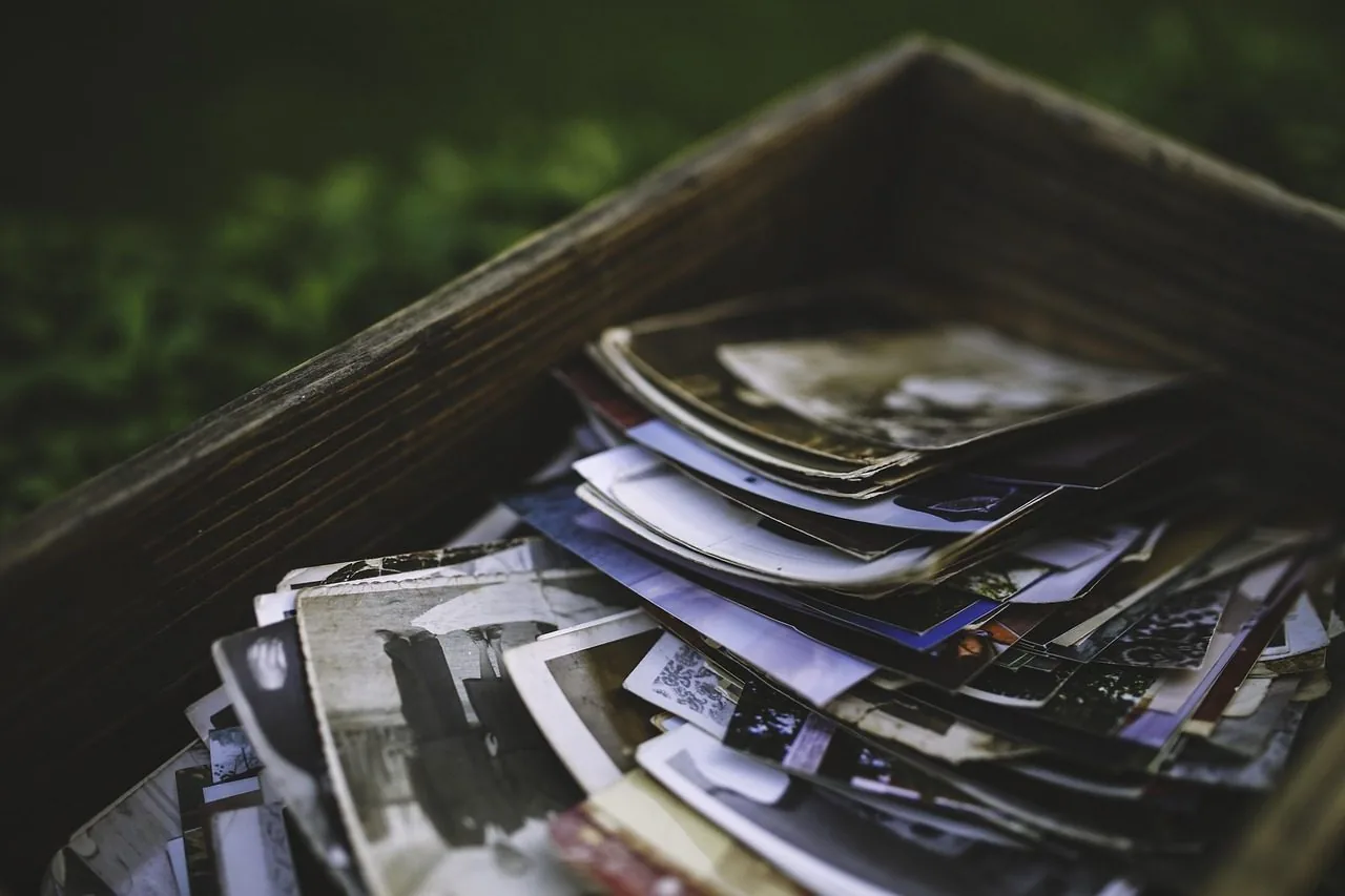 A box of old printed photographs
